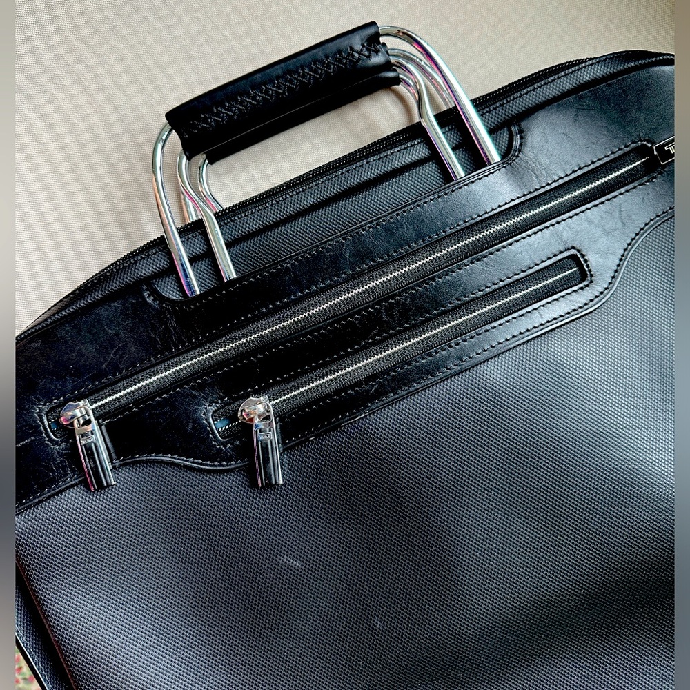 TUMI Arrive Leather briefcase with retractable hardware handle